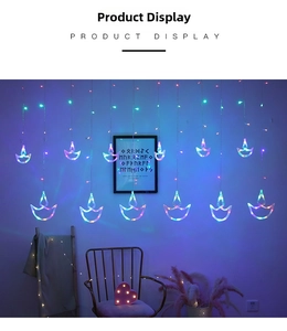 Colorful LED curtain string lights featuring Diya shaped pendants for festive wall decor