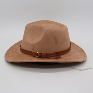 Detailed view of camel suede fedora hat featuring a brown decorative band with metal buckle