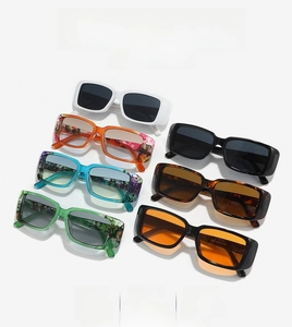 Detailed grid of vintage rectangular sunglasses in various colorful frames and lenses