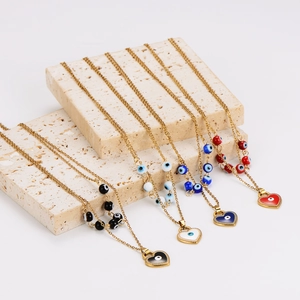Luxurious gold necklaces with heart-shaped devil eye pendants in multiple colors