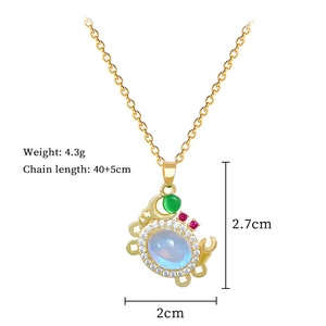 Detail of colorful crab pendant necklace with crystal inlay and technical dimensions
