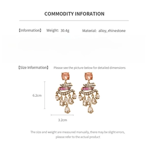 Detailed view of vintage rhinestone drop earrings showing 6.2cm height and alloy material