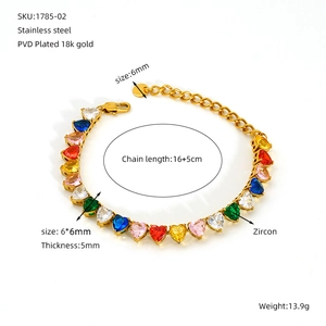 Close-up of 18k gold plated stainless steel bracelet with colorful heart zircons details