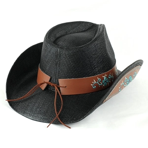 Close-up of black straw cowboy hat with embroidered floral brown leather band detail