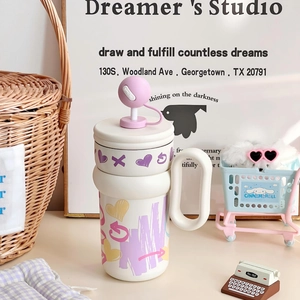 Detail of cute 316 stainless steel cup with smile lid and colorful heart prints