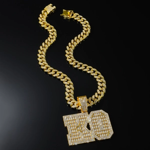 Hip hop gold Cuban chain necklace with iced out KO letter pendant and sparkling zircons