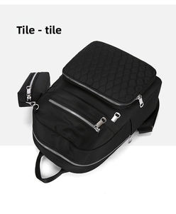 Sac à dos matelassé en tissu oxford noir avec petite pochette, sac de voyage décontracté.