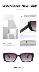 Detail of square black frame sunglasses featuring purple gradient lenses and wide temples