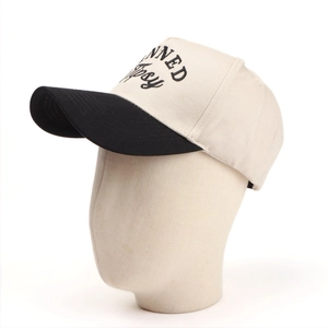 Detail of multi-color baseball cap with PLANNED Tipsy embroidery and black curved brim