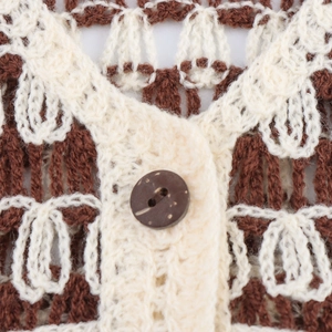 Hollow V-neck crochet knit vest with contrast pattern and single button detail