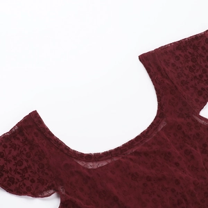 Close-up of deep red floral lace texture and U-shaped neckline on a slim fit top