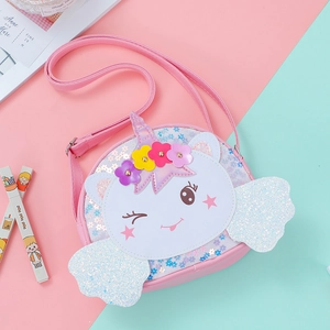 Detailed view of pink unicorn sequin crossbody bag with glitter wings and floral decor