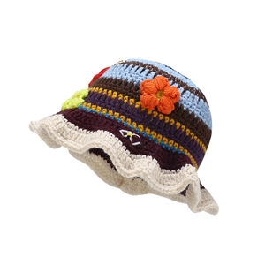 Handmade crochet floral bucket hat with colorful stripes and wavy brim design