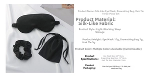 Detail of black faux silk sleep set including eye mask, scrunchie and drawstring pouch