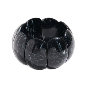 Irregular geometric resin bangle featuring a vintage black and white marble pattern finish