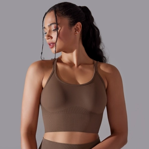 Detailed close-up of brown seamless ribbed sports bra and high-waist fitness yoga set