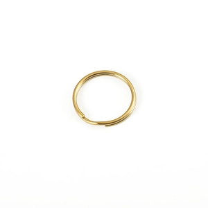 Polished gold stainless steel double loop split key ring accessory on white background