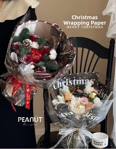 DIY Christmas flower bouquet wrapping paper with festive ribbons and floral arrangements