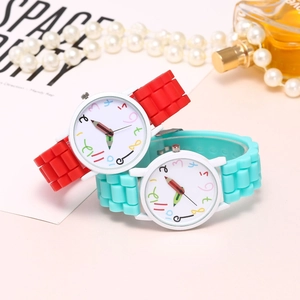 Detail of colorful pencil-shaped hands and vibrant numbers on the kids' quartz watch