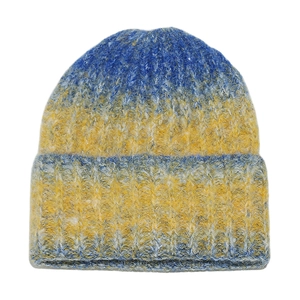 Detailed view of coarse knit texture on blue and gold gradient winter beanie hat