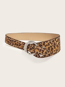 Detail of leopard print punk belt with silver studs and circular metal buckle