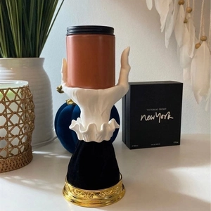 Gothic witch hand candle holder with vintage gold base and glass jar for Halloween decor