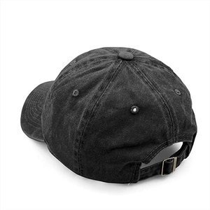 Close-up of washed cotton baseball cap featuring adjustable metal buckle and stitching