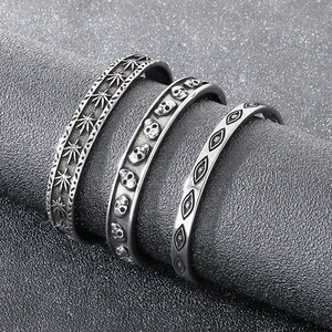 Bracelets punk gothiques en acier avec gravures de crâne, feuille d'érable et œil