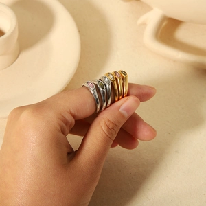 Retro 18K gold and stainless steel ring set with marquise cut gemstones in multiple colors