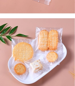 Macro shot of assorted matte frosted self-adhesive bags with white polka dot patterns