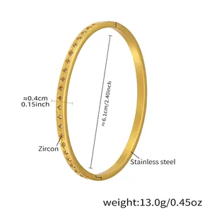 Detail view of 18k gold plated stainless steel bangle with 5A zircon serrated setting