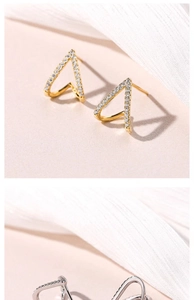 Detail of geometric V-shaped S925 silver stud earrings with sparkling micro-pave zircons