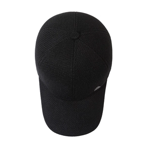 Men's winter baseball cap in black textured fabric with ear flaps and metal emblem