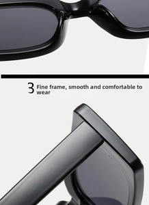 Detailed view of the nose pads and hinges on black square frame sunglasses