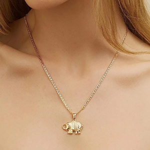 18K gold plated elephant pendant necklace featuring a textured animal charm on model