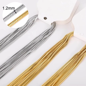 Detail of 1.2mm stainless steel snake chains in gold and silver for jewelry making