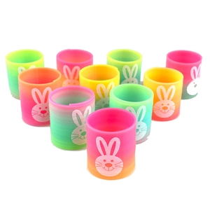 Rainbow spring toys with bunny prints in colorful gradient plastic arranged for kids