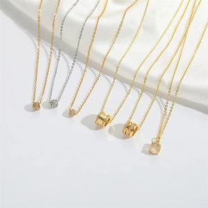 Minimalist cat eye stone and zircon pendants on gold and silver chain necklaces