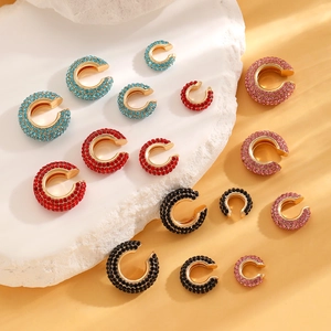 Sparkly C-shaped rhinestone ear cuffs in multiple colors with gold alloy plating