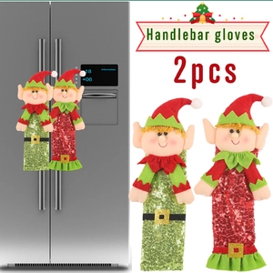 Detail of red and green Christmas elf refrigerator handle covers with sequin fabric texture