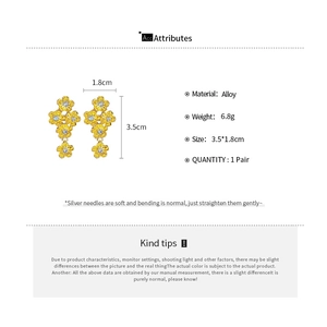 Detail specifications of golden flower drop earrings with white zircons and silver posts