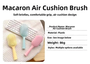 Detailed view of an 86g macaron-colored hairbrush with soft bristles and air cushion