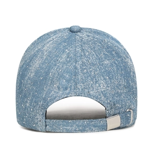 Back view of tie-dye denim baseball cap with sparkling rhinestones and adjustable strap