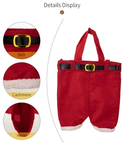 Detailed view of Christmas pants gift bag showing belt buckle and soft cashmere texture
