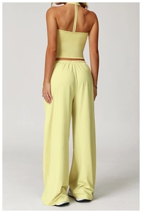 Close-up of elastic waistband and drawstring detail on wide-leg lounge trousers