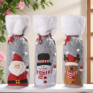 Set of 3 Christmas wine bottle covers featuring Santa, Snowman, and Reindeer motifs