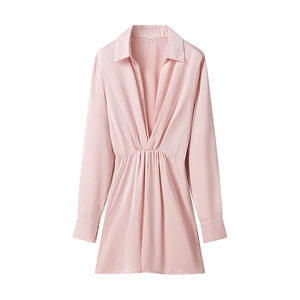 Close-up of pink long sleeve V-neck dress with silky satin texture and pleated waist detail