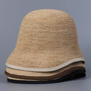 Handwoven raffia bucket hat for women with stylish contrasting trim in multiple colors
