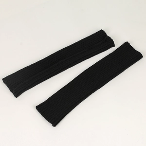 Detail of black ribbed knit leg warmers showing soft texture and elastic cuff weave