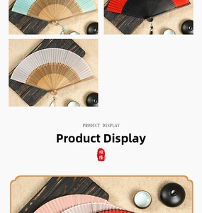 Detail of silk folding fans with bamboo ribs and matching tassels in various pastel colors